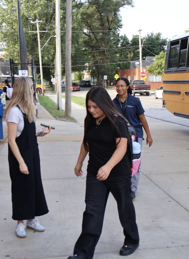 bus riders enter the middle school for their first day!