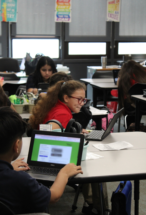 Student working on laptops 