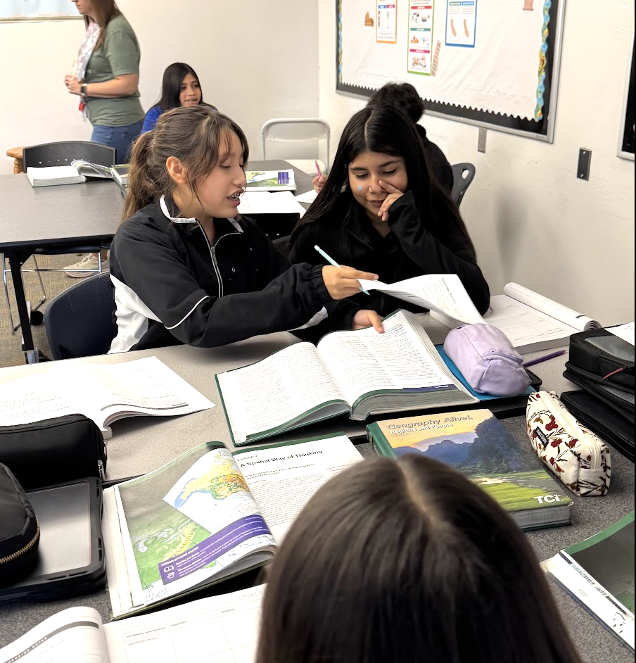 students reading in class