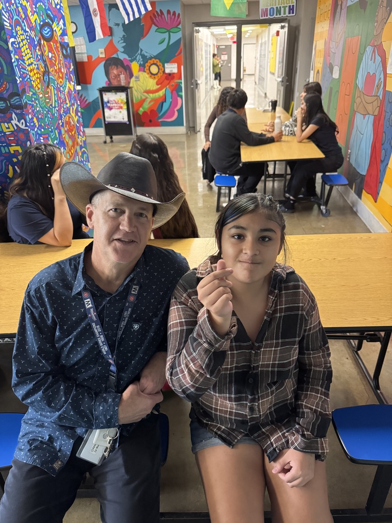 teacher and student dressed up western
