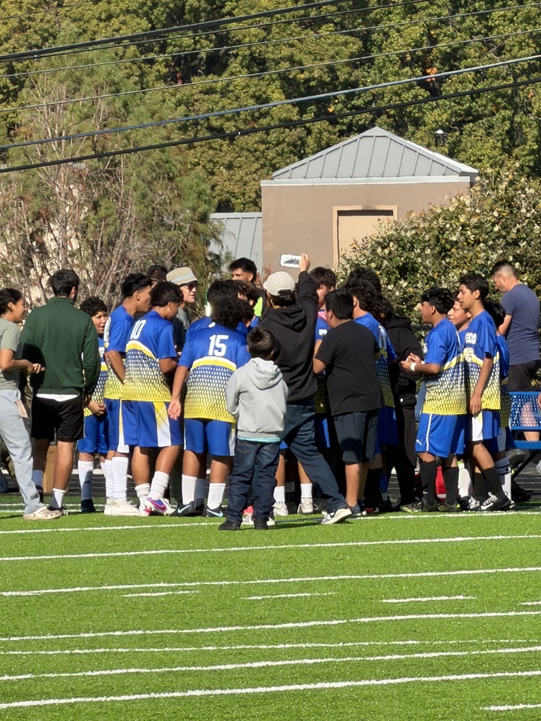 the soccer team huddled up
