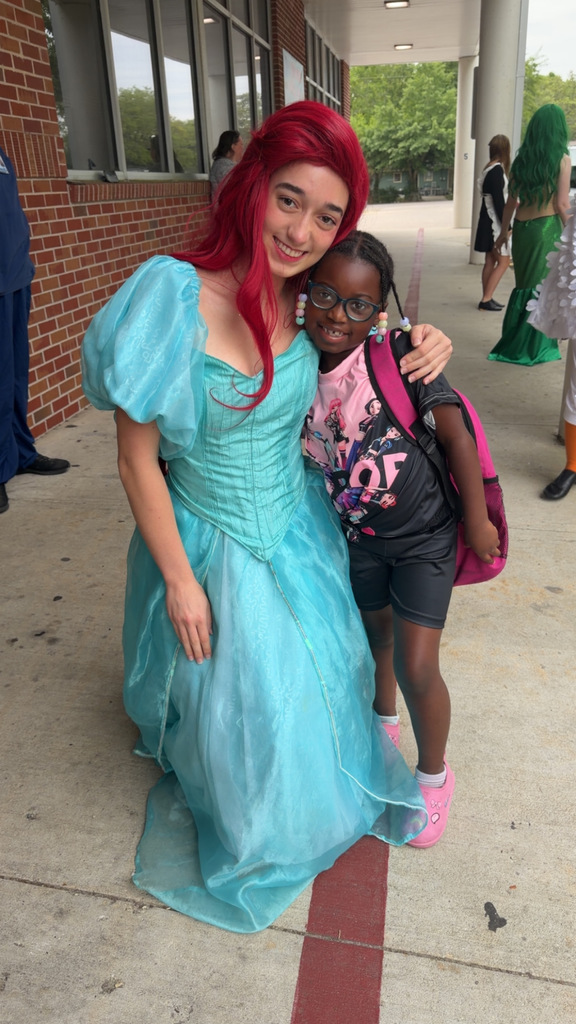 Cast members of Gulfport High School's Admiral Little Theater production of The Little Mermaid greeting our students