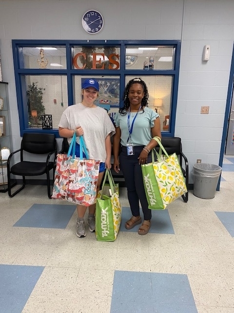 A member of the Junior Auxiliary distributing the snacks to Ms. Casey, our counselor