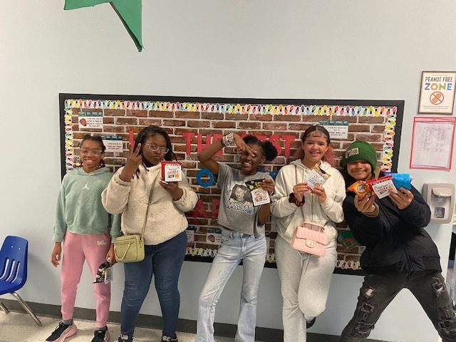 5th grade students, excited to receive their snacks!