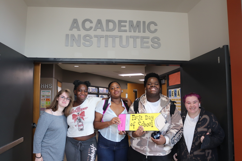 First Day of School a group of students in front of Academic Institutes of Gulfport hallway. 