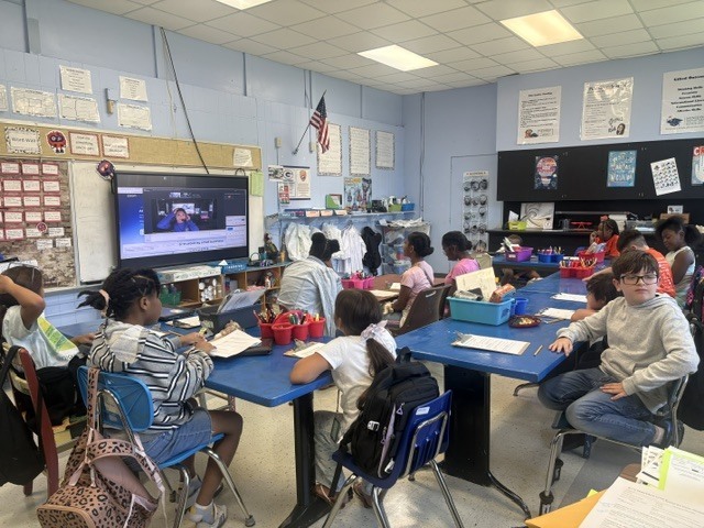 4th & 5th grade QUEST students enjoying a live, virtual session with the research team aboard the E/V Nautilus.