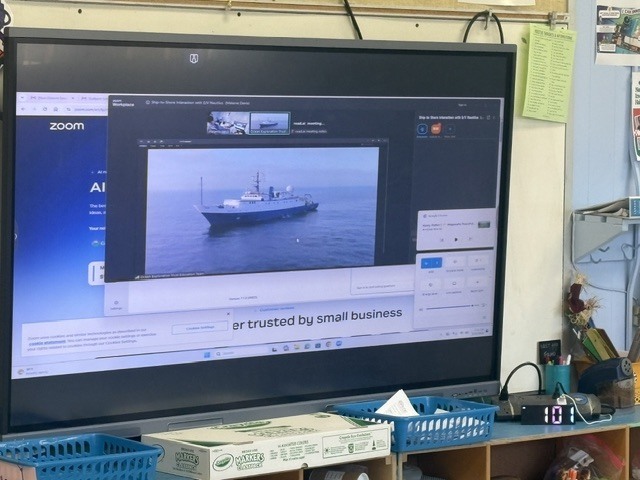 A computer screen showing a picture of the E/V Nautilus