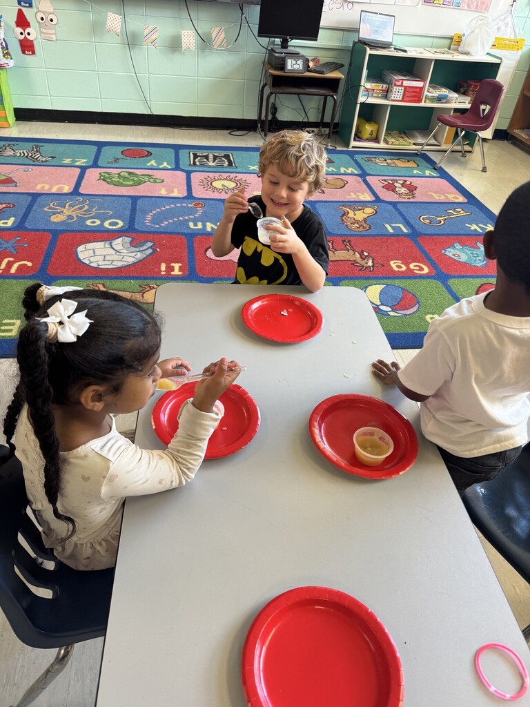 Students tasting their apples