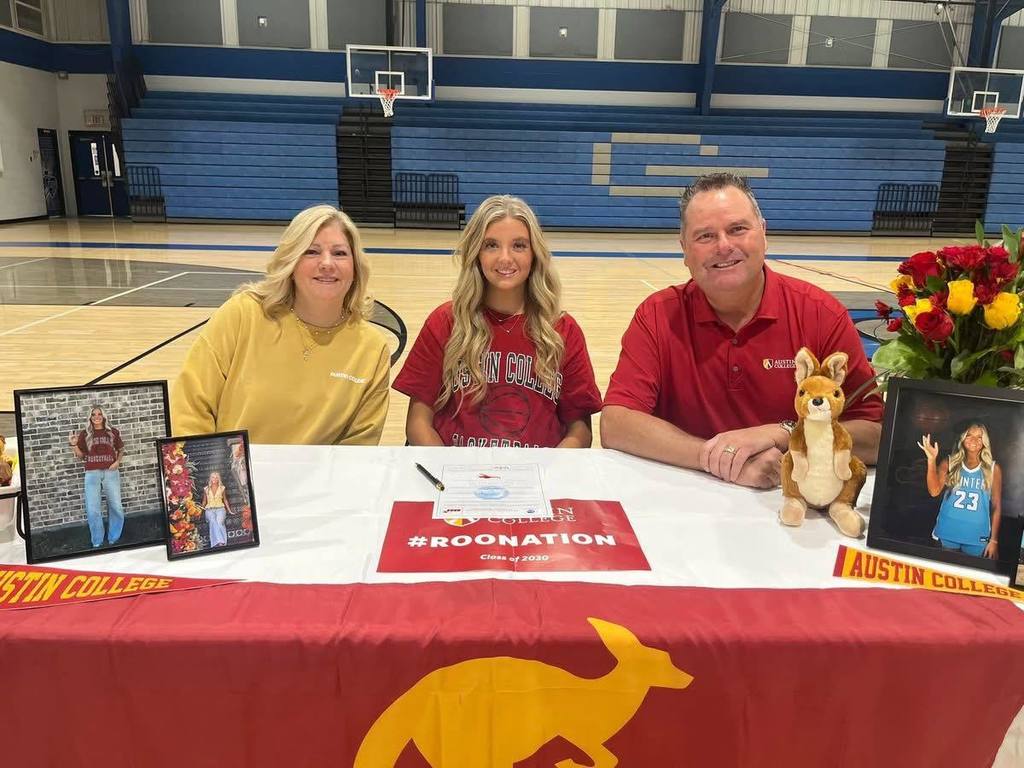 Basketball Playing signing with Austin College.