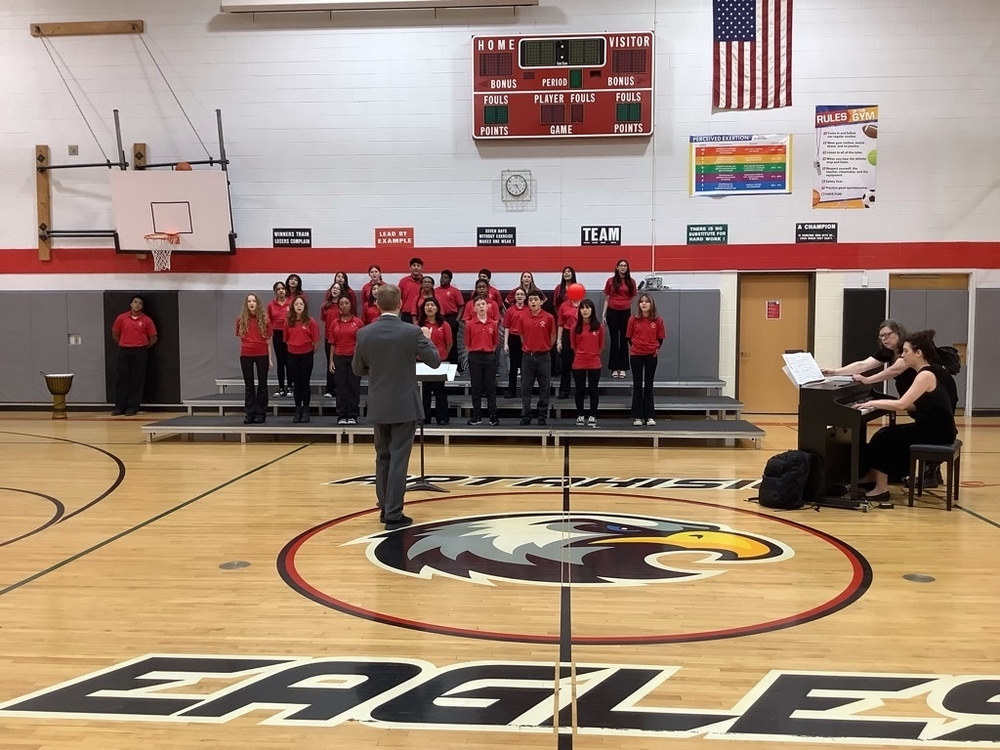 choir peforming in gym