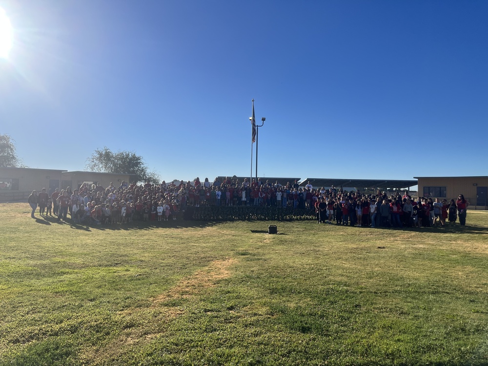 Students gathers around the 9-11 Memorial Garden