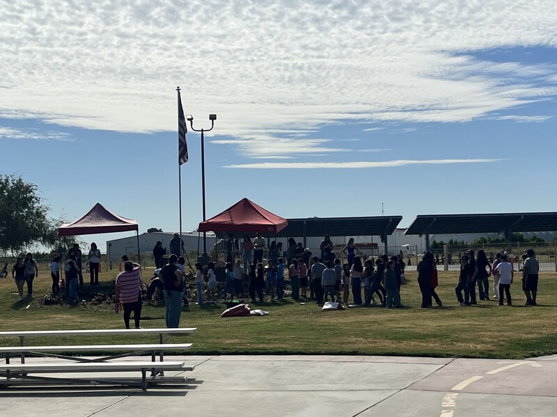 Students helping during recess