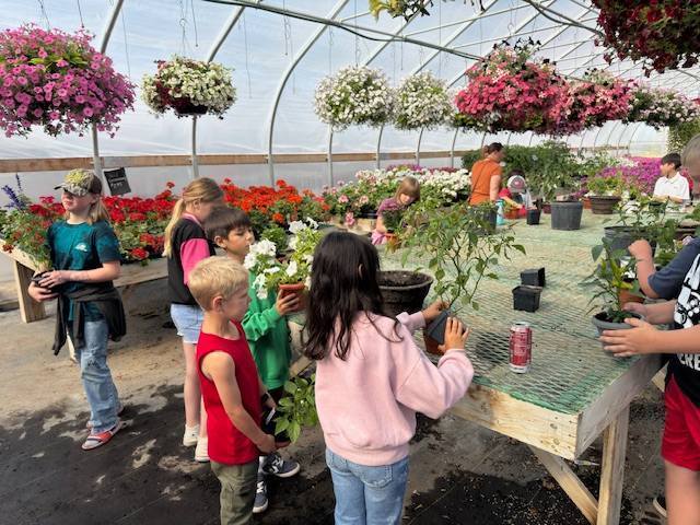 Our summer students were treated to a day of learning at the Country Greenhouse in Buhl.