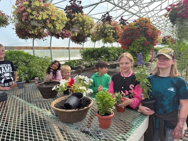 Our summer students were treated to a day of learning at the Country Greenhouse in Buhl.