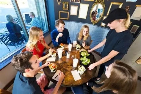 people being served at a restaurant