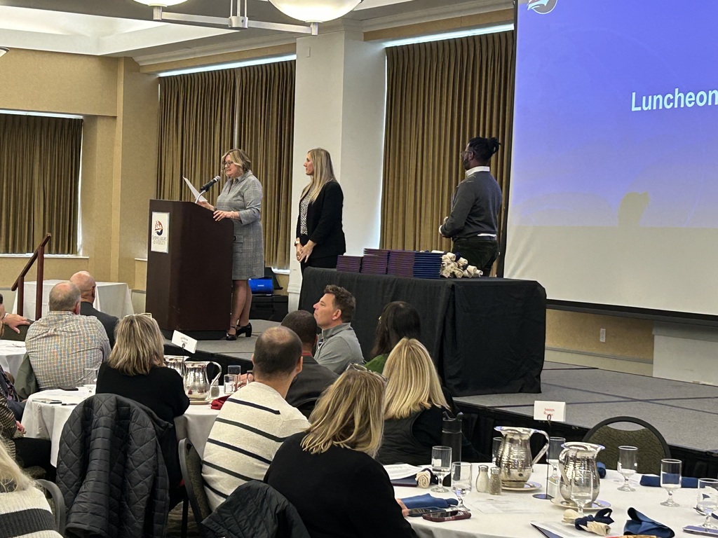 Mrs. Nestler receiving her award.