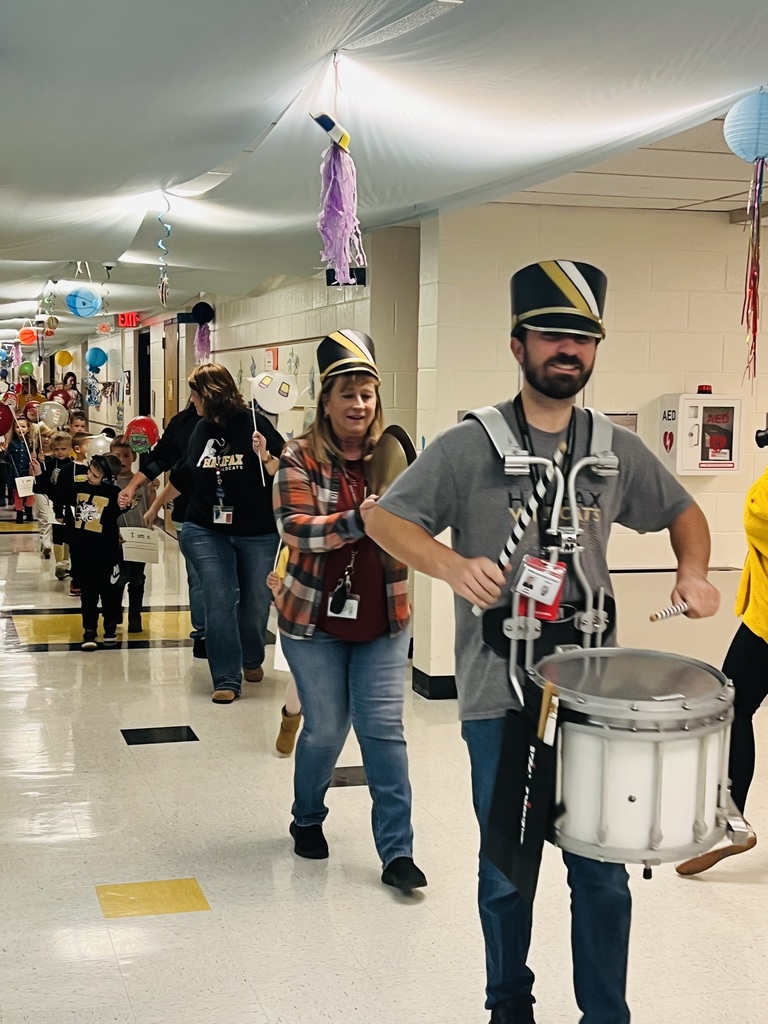 Mr.  Kramer and Mrs. McKenzie leading off the parade.