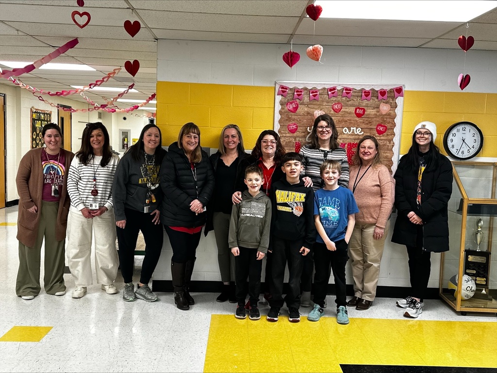 Volunteers preparing our snack packs.