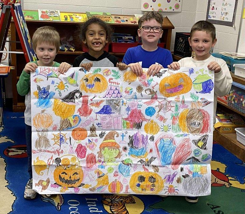 Students Work Together to Complete Halloween Posters
