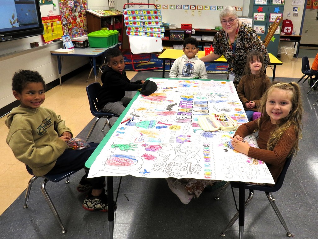 Students Work Together to Complete Halloween Posters 