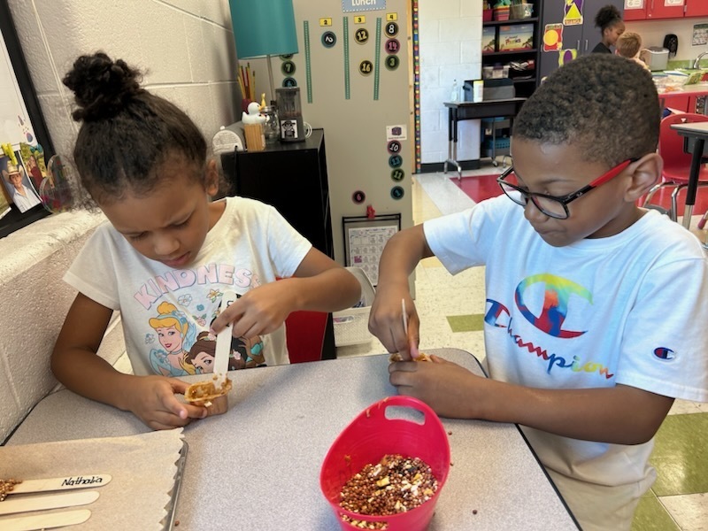 Ms. Snead's first graders make bird feeders