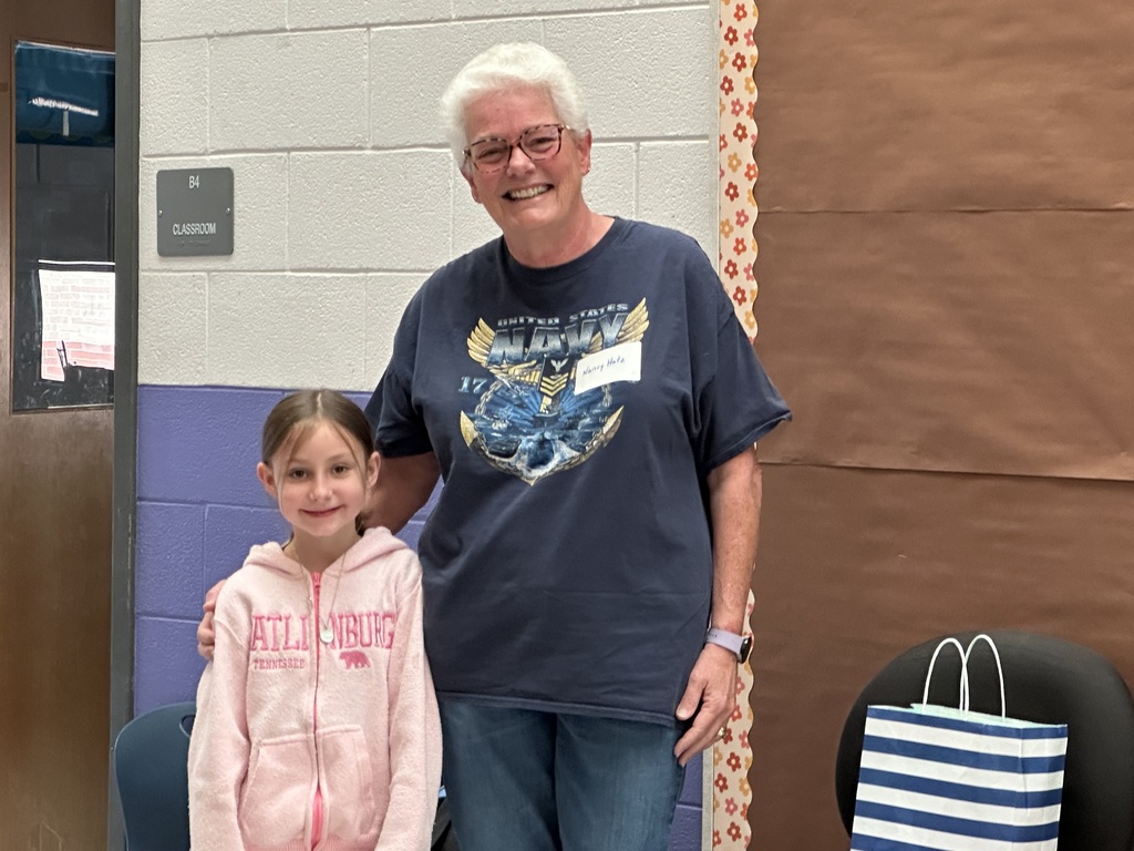 Mrs. Hatz reads to 1st graders in honor of Veterans Day