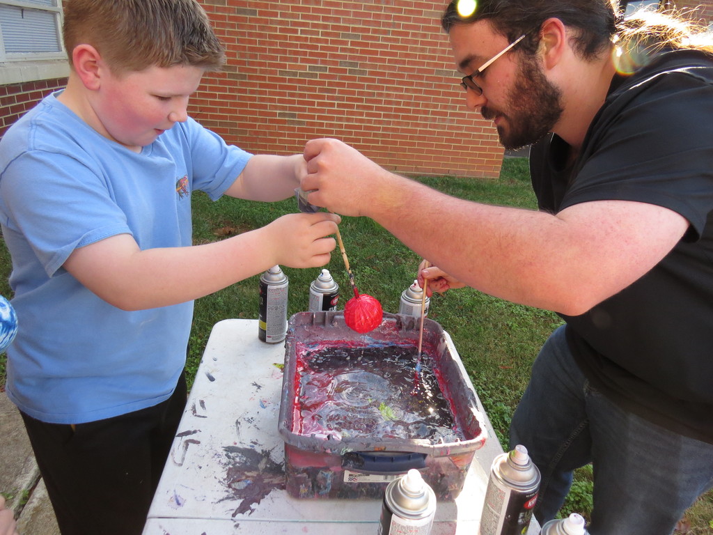 Students At Scottsburg Elementary Explore Hydro Dipping in Art Class