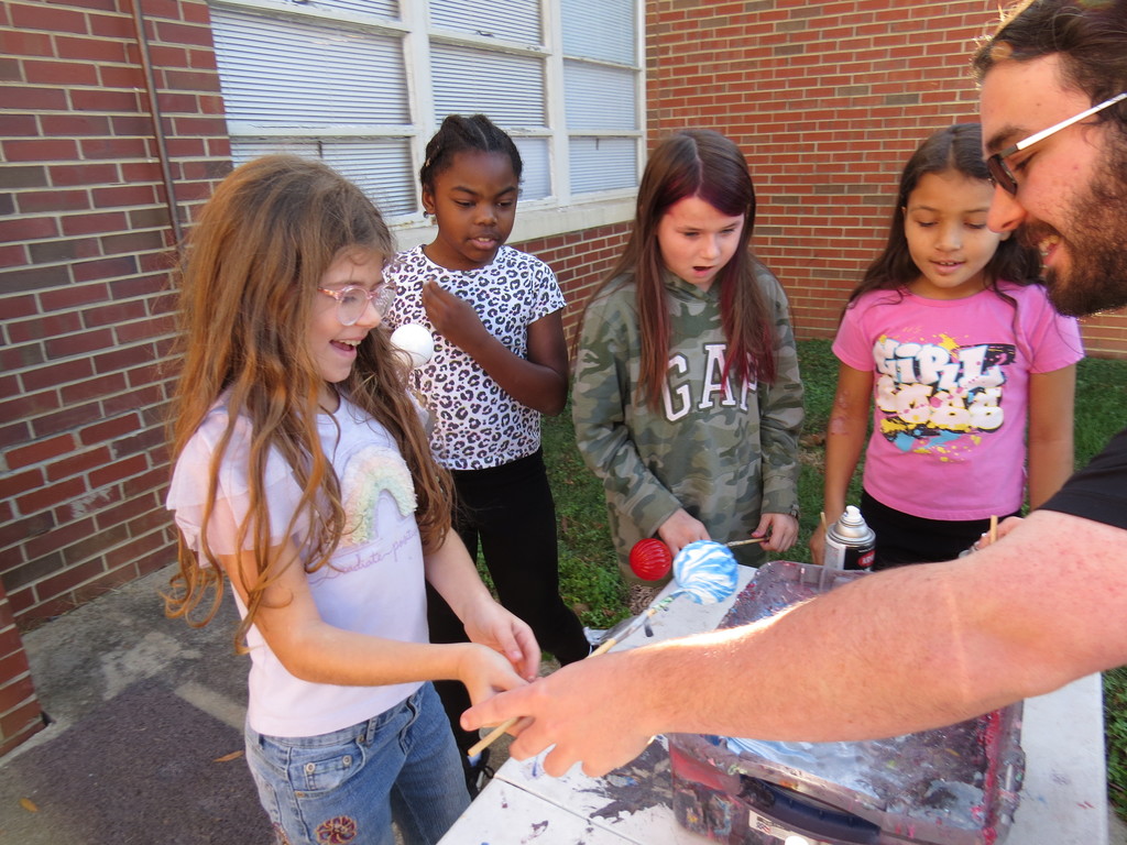 Students At Scottsburg Elementary Explore Hydro Dipping in Art Class