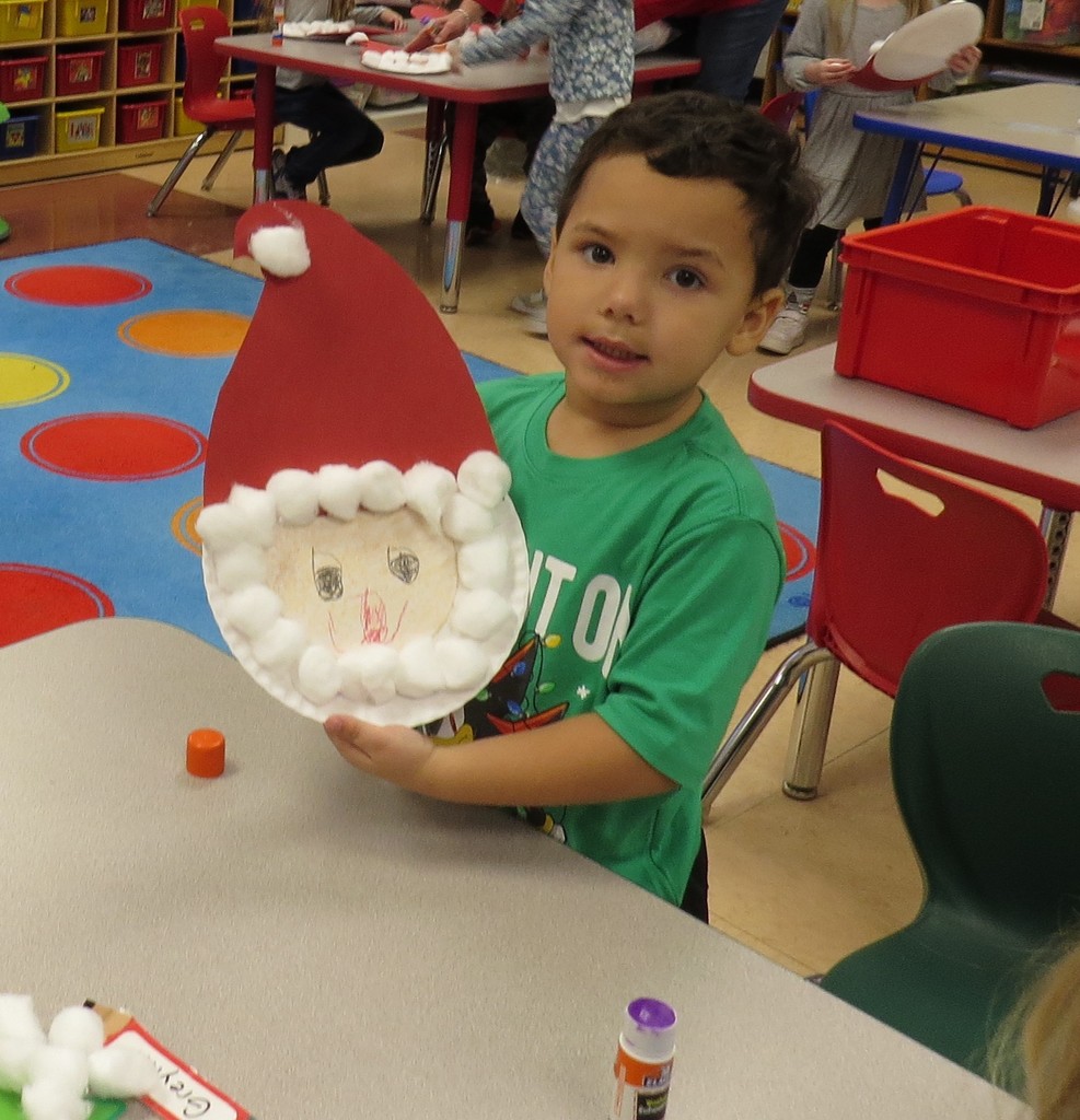Pre-K Students Create Santa Faces Using Various Shapes 