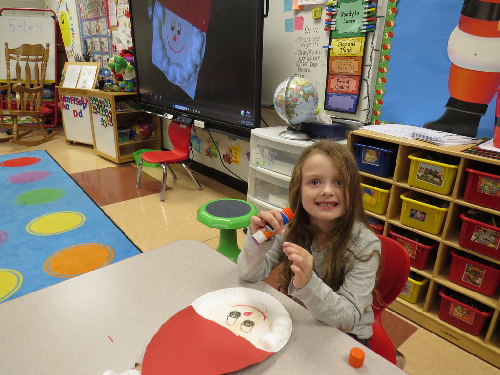 Pre-K Students Create Santa Faces Using Various Shapes 