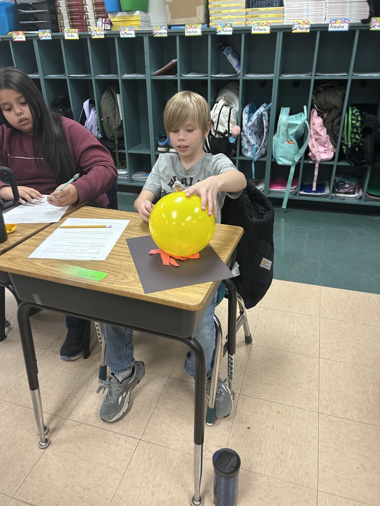 Fifth Graders Investigate Static Electricity During Science Class