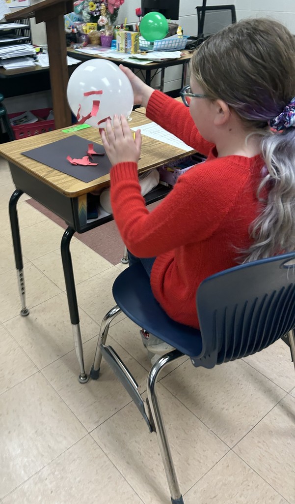 Fifth Graders Investigate Static Electricity During Science Class
