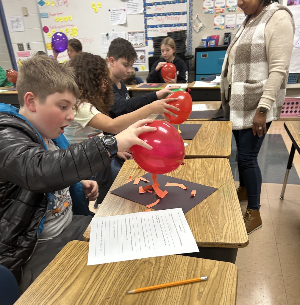 Fifth Graders Investigate Static Electricity During Science Class