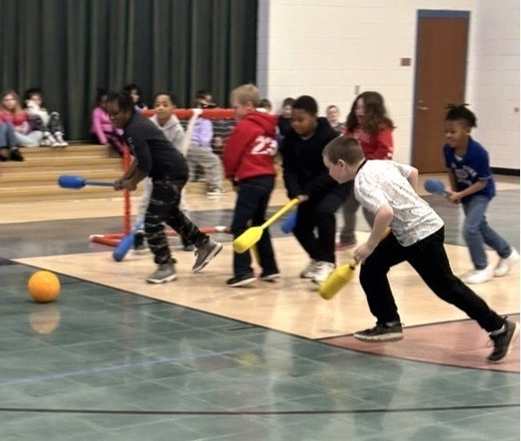 Students Learn Hockey Skills During PE