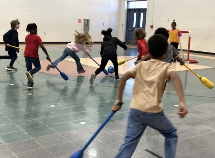 Students Learn Hockey Skills During PE