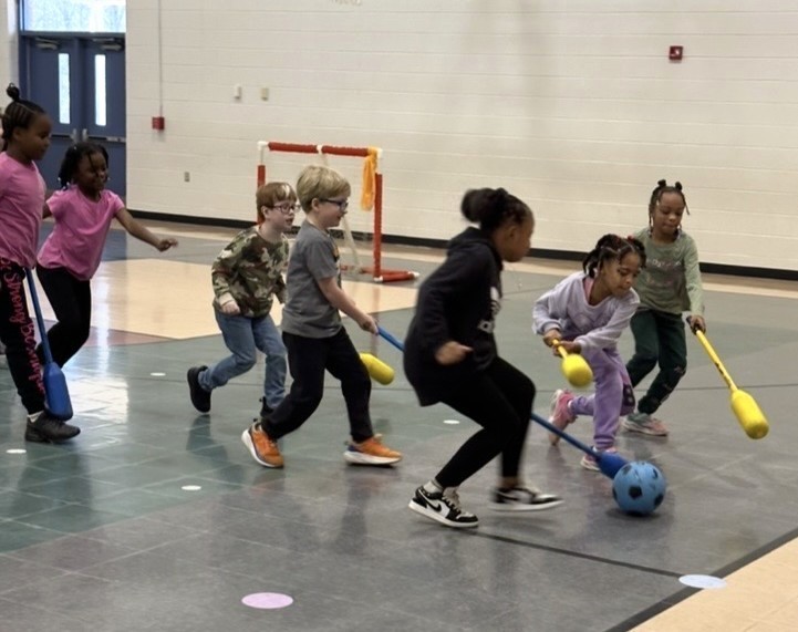 Students Learn Hockey Skills During PE