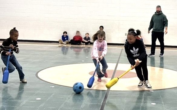 Students Learn Hockey Skills During PE