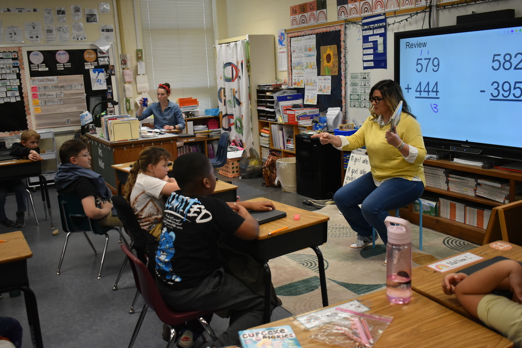 Mrs. Runion  reads Cat in the Hat