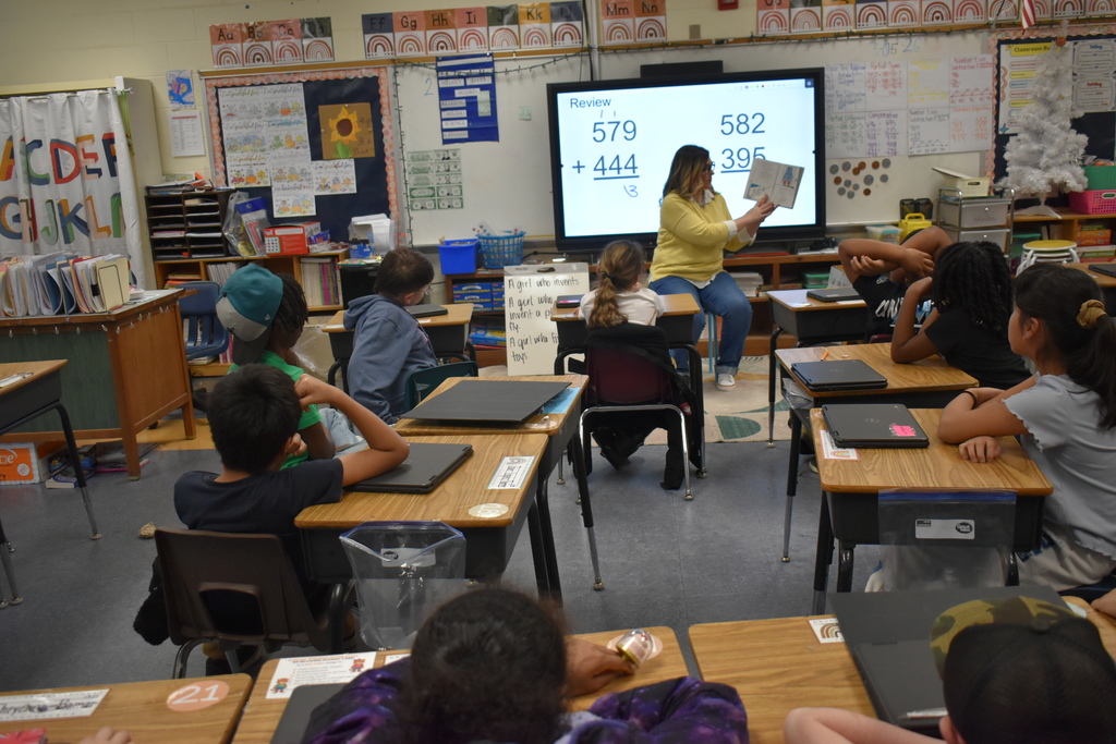 Mrs. Runion  reads Cat in the Hat