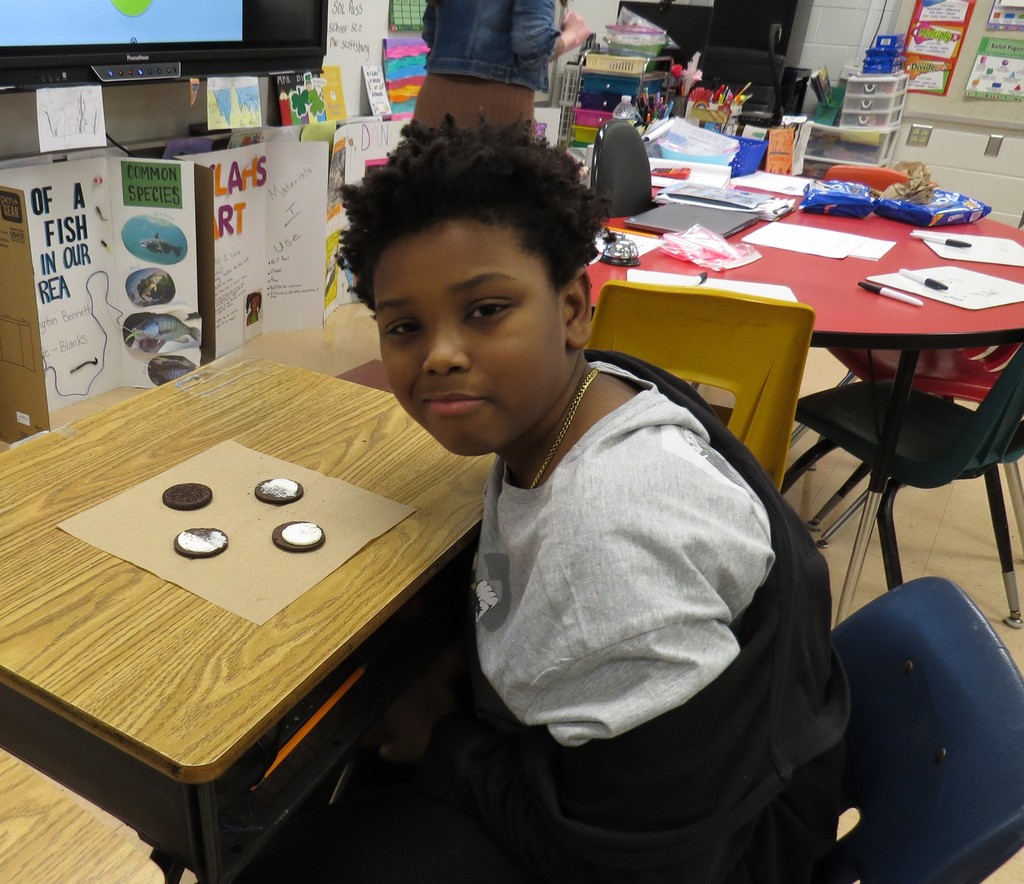 Students Learn About The Moon Phases and Make Models Out of Oreo Cookies