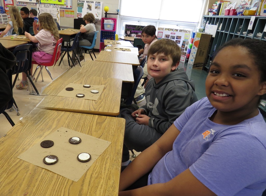 Students Learn About The Moon Phases and Make Models Out of Oreo Cookies