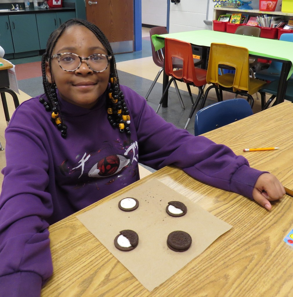 Students Learn About The Moon Phases and Make Models Out of Oreo Cookies