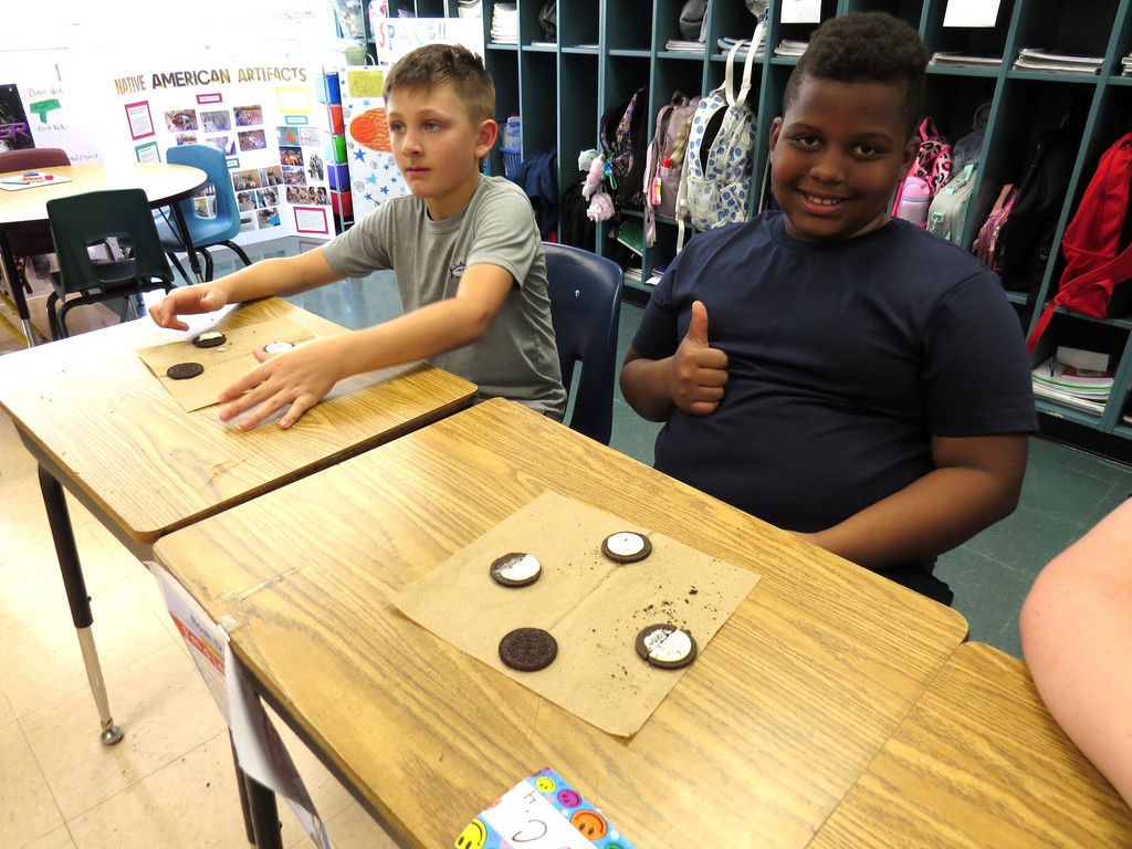Students Learn About The Moon Phases and Make Models Out of Oreo Cookies