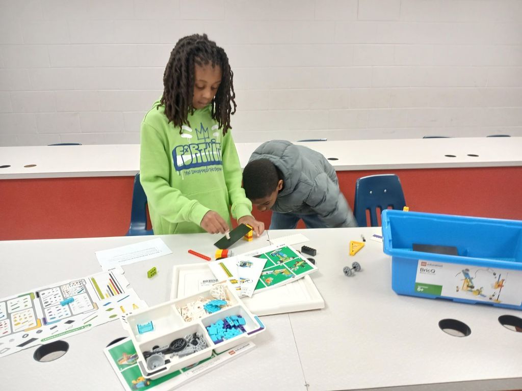 Third graders making simple machines using Lego Education kits