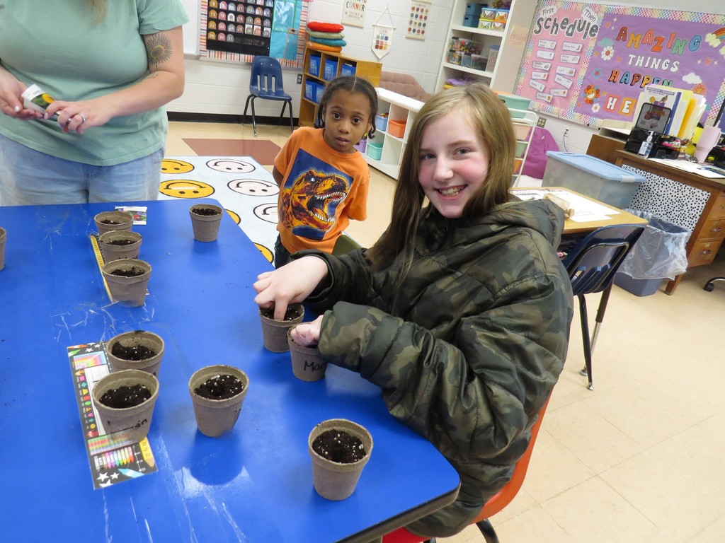 Students Enjoy A Hands-On Lesson About Growing Plants