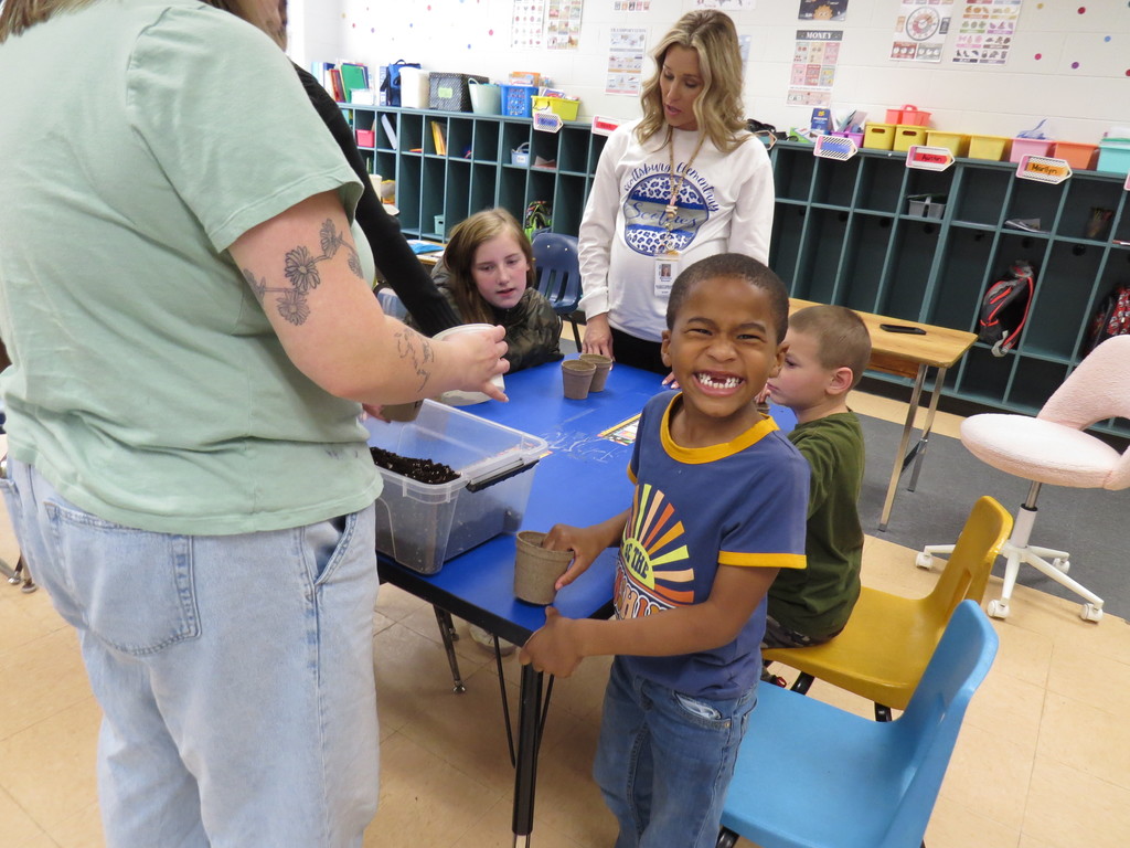 Students Enjoy A Hands-On Lesson About Growing Plants