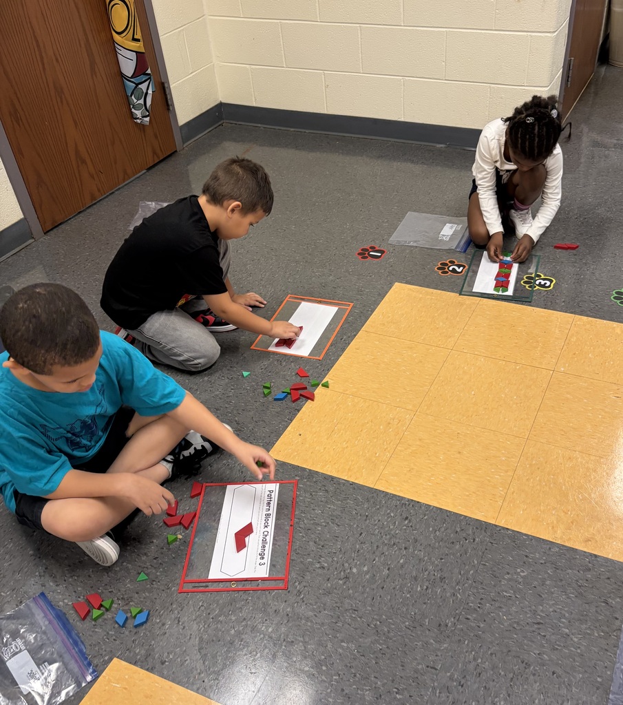 students working with pattern blocks