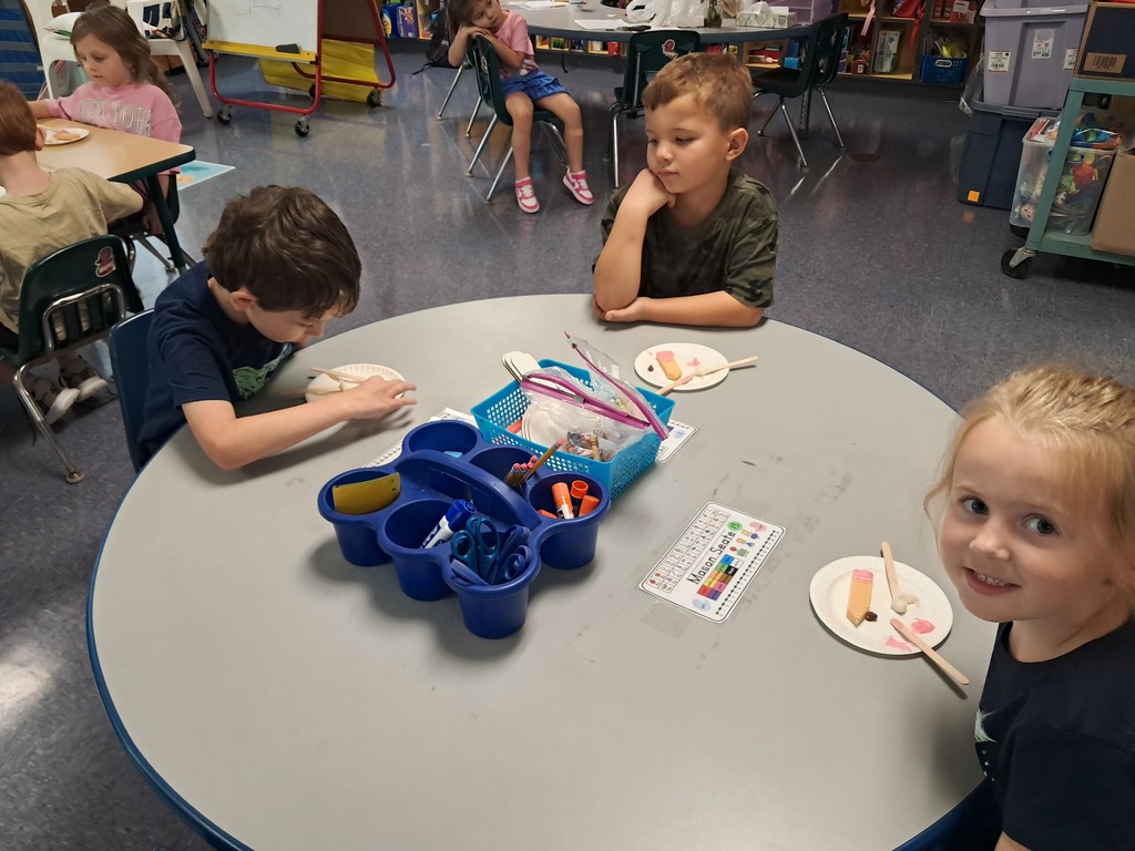 scholars making edible pencils