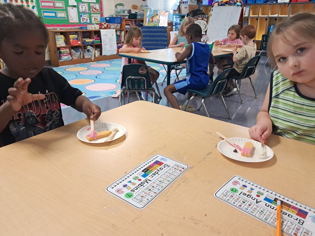 scholars making edible pencils