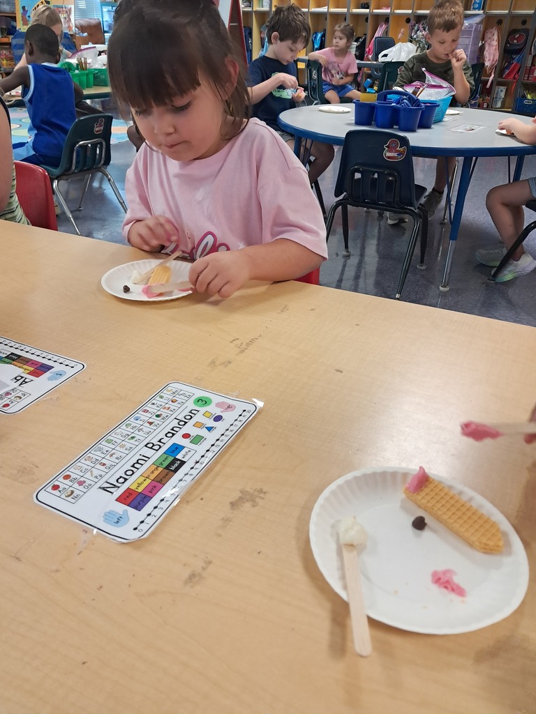 scholars making edible pencils